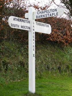 Holiday Cottages in North Devon , Traditional signpost opposite our holiday cottages.